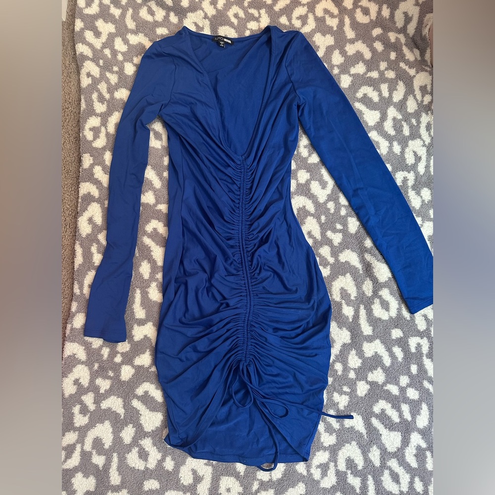 Tight dress. Cinches to body.